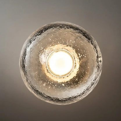 Embrace Modern Outdoor Wall Lamp - Clear Glass & Metal Round Design for Garden