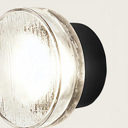 Embrace Modern Outdoor Wall Lamp - Clear Glass & Metal Round Design for Patio