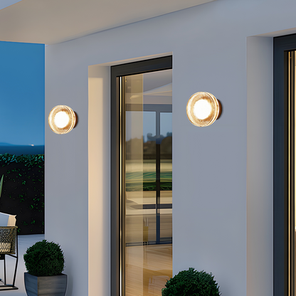 Embrace Modern Outdoor Wall Lamp - Clear Glass & Metal Round Design for Patio